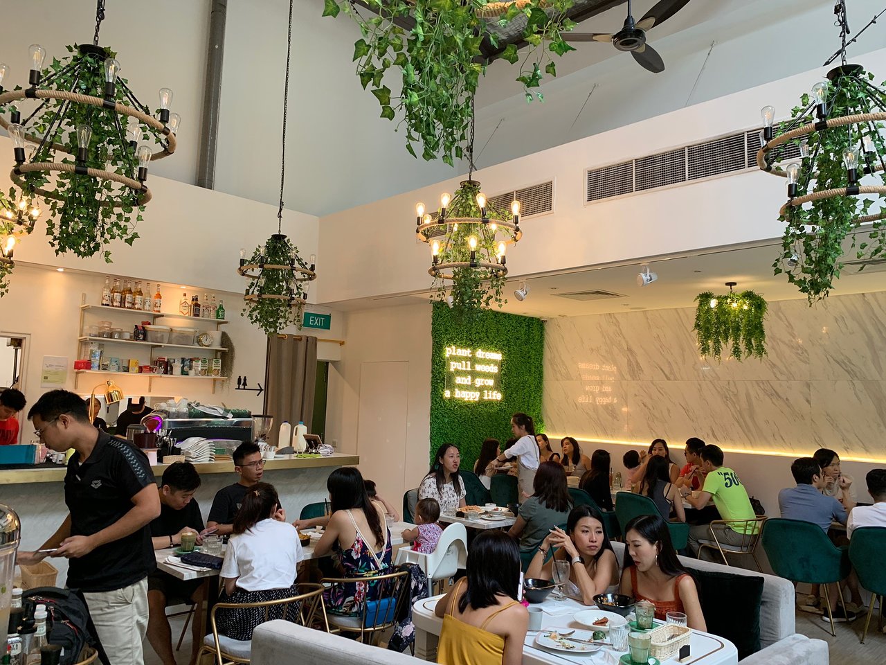 Traveller at Robertson Quay using phone in quiet cafe