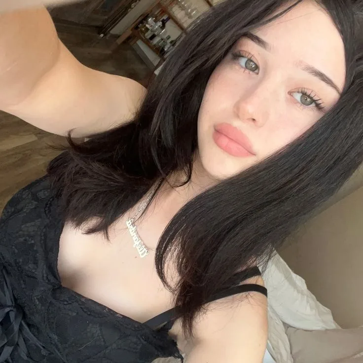 traveller in Orchard Road hotel browsing Escort Near Orchard website on laptop