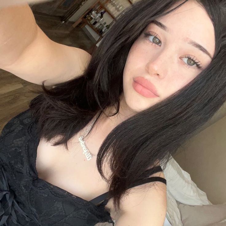 traveller in Orchard Road hotel browsing escort website on laptop